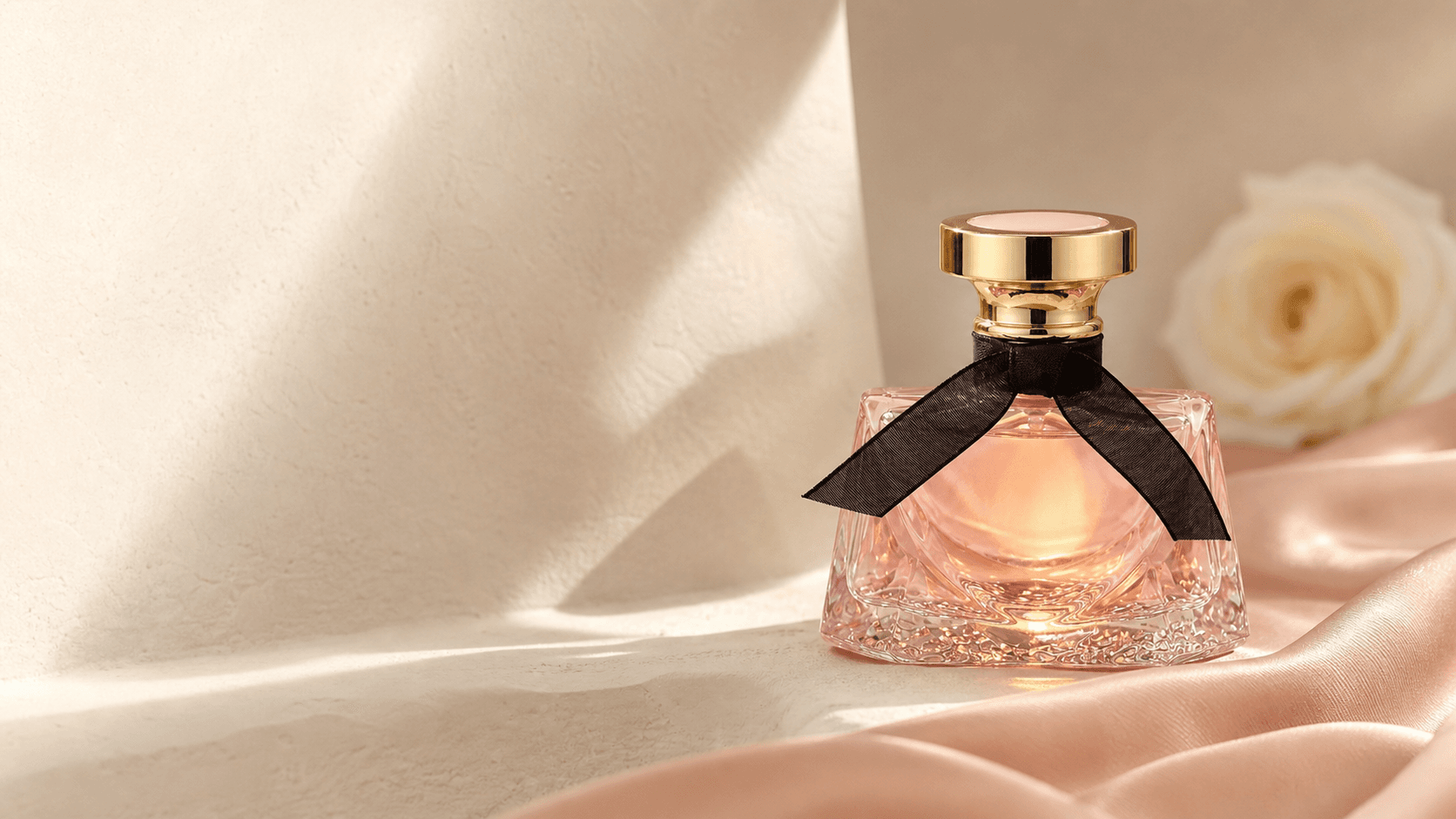 Skinglow Rosée perfume bottle in warm afternoon light